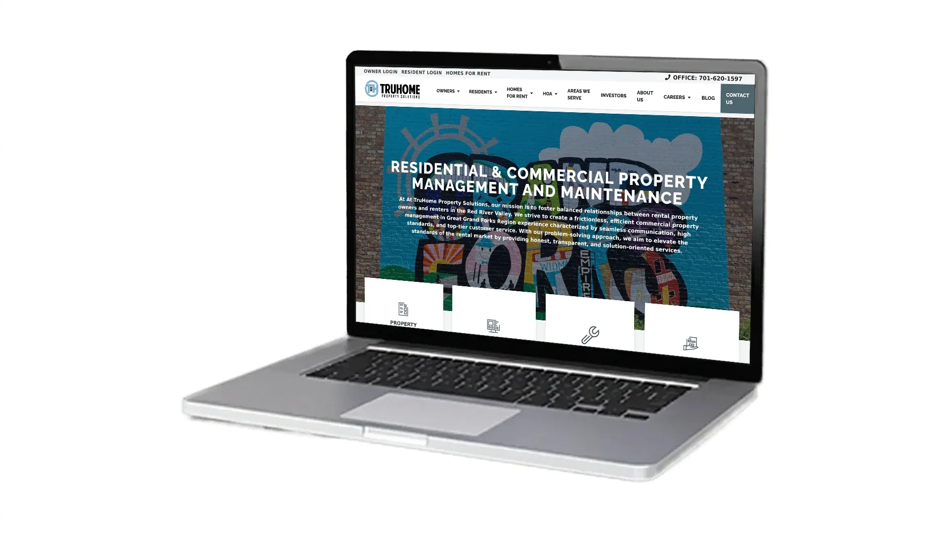 Dawson Property Management website screenshot on laptop